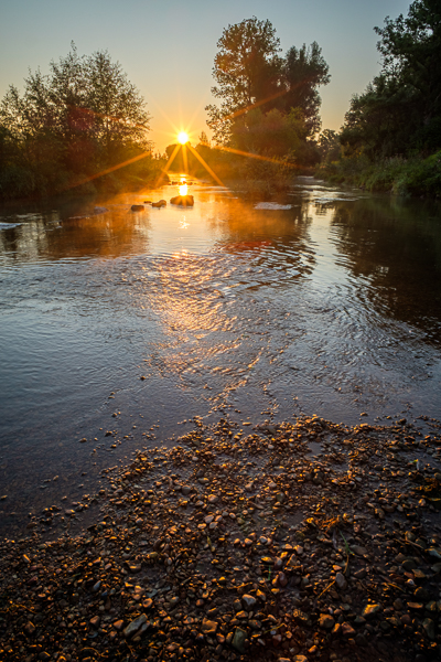 Sonnenstern am Fluß mit dem Nisi 15 mm